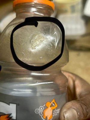 Food smudged on Gatorade