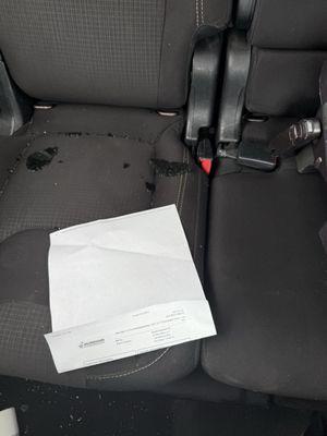 Glass on the seat with receipt