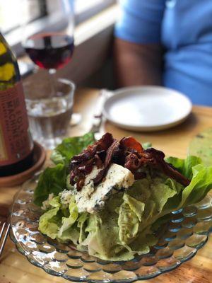 Wedge salad with a generous portion of blue cheese, amazing green dressing and the crispiest bacon!