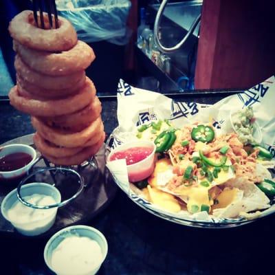 Beer battered onion rings, chicken nachos