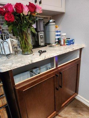 This is my mother's unfinished coffee bar that has been waiting for hardware since July.