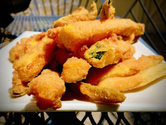 Zucchini sticks and the one fry that couldn't resist jumping in