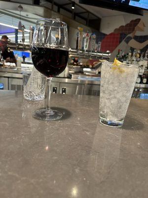 Pinot Noir and water, kinda sports bar, kinda just bar