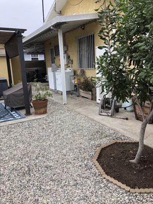 Felipe Campos and his team's borders, weed barrier, and pebbles.