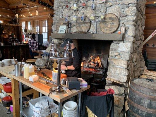 Steak cooking over open fire