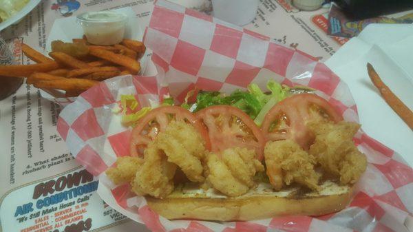 Shrimp Poyboy with Sweet potato fries.  The shrimp were hot and juicy! Fries were cold. But I enjoyed the meal!