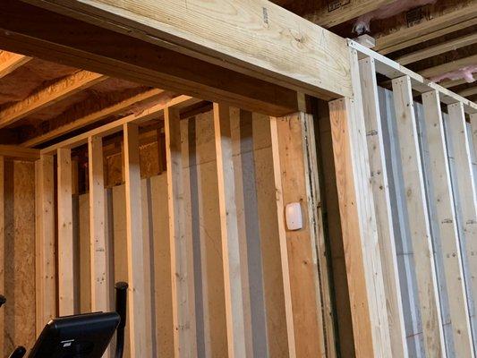 Unfinished basement being framed and finished.