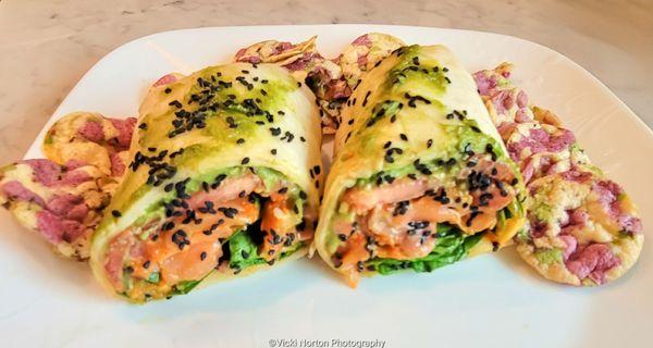 SalmonDance is delicious   Tortilla, Smoked Salmon, Lemon, Fresca Sauce, House made Smashed Avocado, Spinach, Sliced Tomatoes