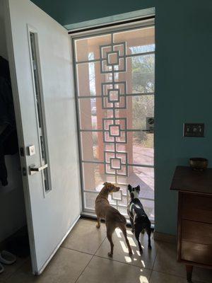 New security door with a custom square in square design to match our breeze block porch columns.