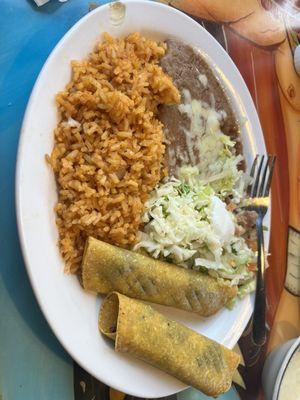 Beef flautas and rice and beans w lettuce nd sc .fire