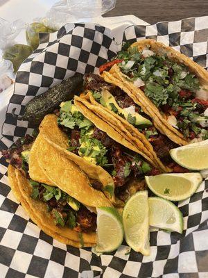 3 Campechano tacos and one pastor. Juicy tender meat good corn taste from the tortillas & fresh salsa. All mouth watering.