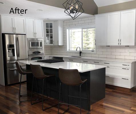 AFTER Cabinet Refinishing - Darker Wood Grain is Refinished to Custom   White Painted Cabinets now enhancing their natural window sunlight