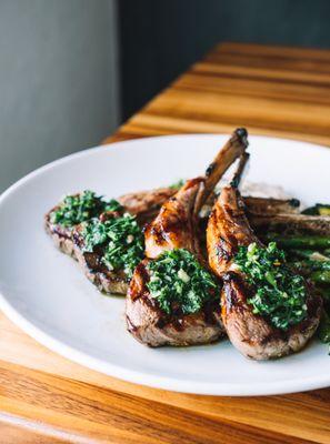 Lamb chops topped with a housemade chimichurri, with redskin mashed potatoes and asparagus.