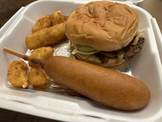 Tray with small burger, corn dog and cheese bites. Drink not pictured