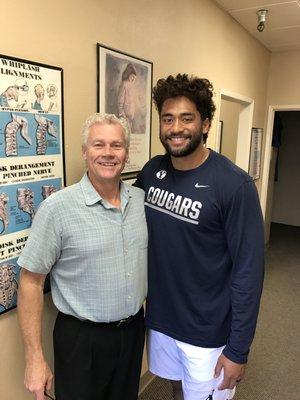 Patient Harvy Langi of the NFL New England Patriots and Dr. Kell