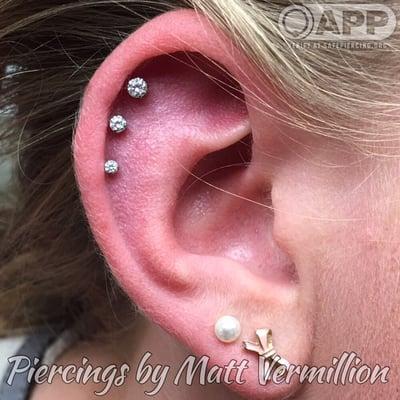 This is a healed triple helix piercing! Featuring jewelry that's f136 implantable grade titanium with Swarovski Crystals.