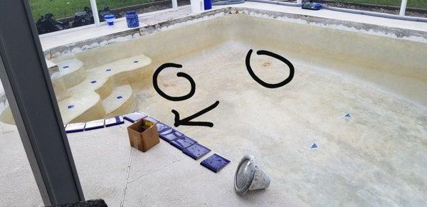 rust stains visible at time of resurfacing that he claims weren't visible when he resurfaced my pool.