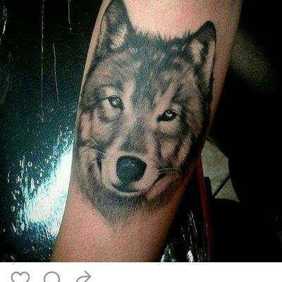 Wolf tattoo by Melissa T.