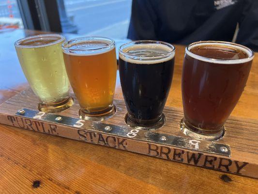 Flight of beers -- German Pils, Belgian Witbier, Schwarz (black) Lager, Maple Rye Belgian Dark (L to R)