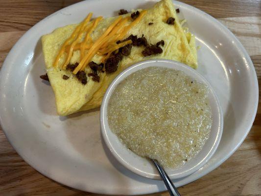 Sausage and cheese Omelette with grits