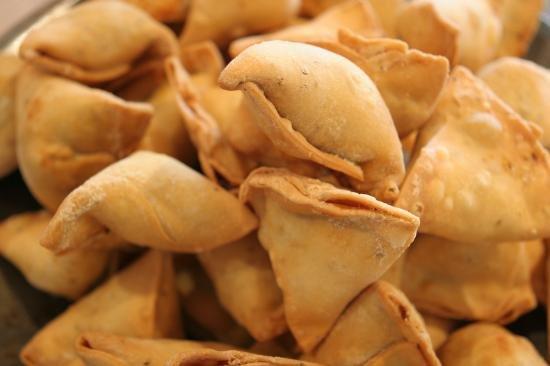 The biggest samosas, weighing double, double the size compared to the average with different stuffing, different recipe and different dough.