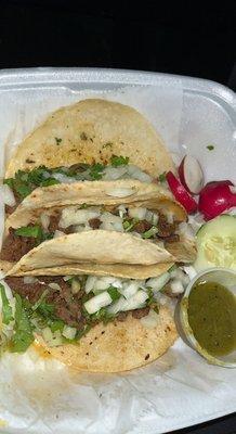 Carne asada tacos with green salsa