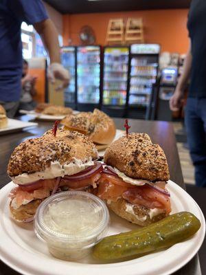 Everything bagel, salmon vegetable cream cheese, with  tomatoes and onions