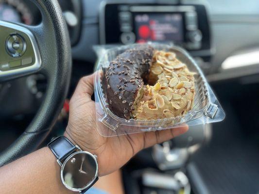 Half Chocolate Doughnut with Cocoa Nibs and Dulce de Leche with Toasted Almonds.