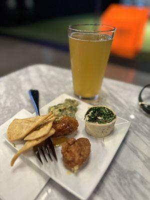 Hot honey wings, wrap, spinach artichoke dip, and draft beer.