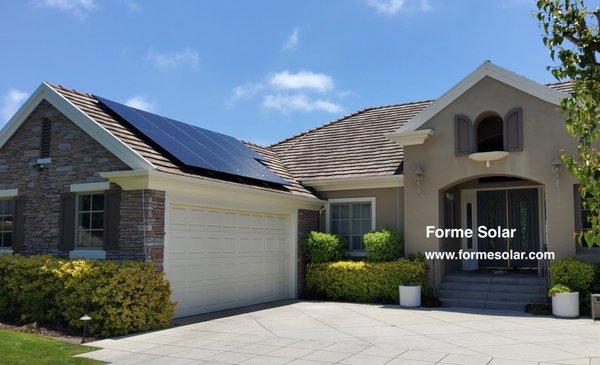 Flat Tile Roof Solar Panel Installation All Black Solar Panels. Microinverters. Black Mounting. Black End Caps