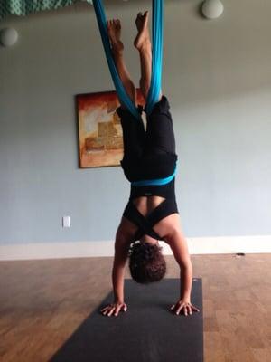 YogAir class- in a handstand pose. Great for decompressing. No yoga experience needed