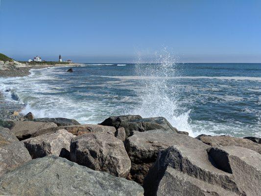 A wave crashing into the jetty