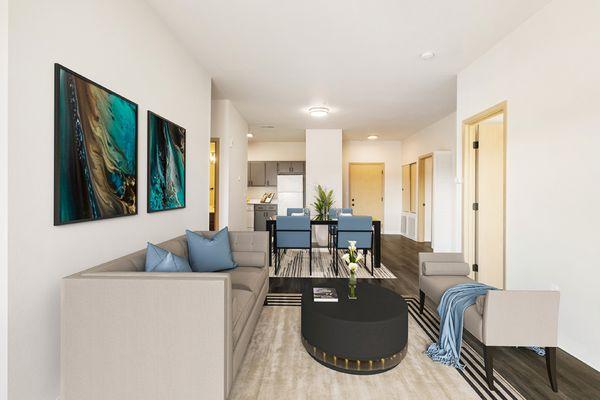 Shoreline Village Apartments in Richland, WA - Bright, clean living room and dining area with faux wood flooring and large windows.