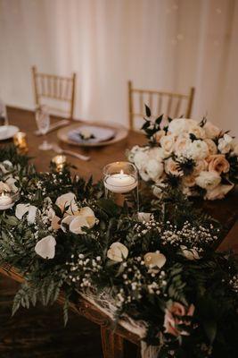 The sweetheart table with my daughter's bridal bouquet