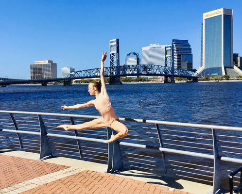 SDJ Dancer showing Joy in front of our city scape!