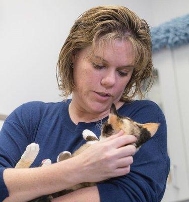 Dr. Pike giving some love to one of our sweet kitty patients.