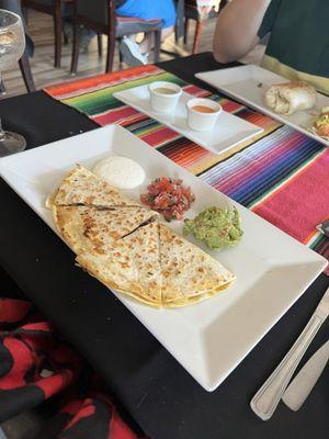 Steak Quesadilla, hot sauces, Veggie Burrito.