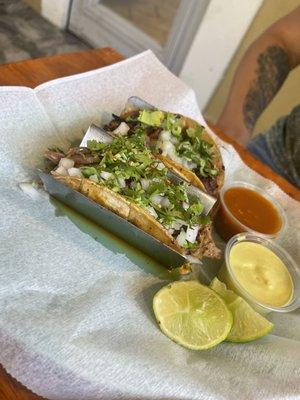 Carnitas and el pastor tacos.