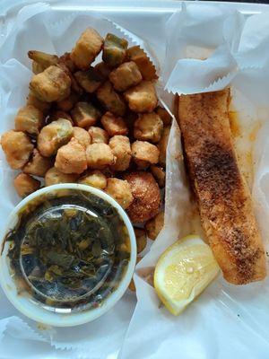 Grilled salmon, greens, fried okra and hush puppies