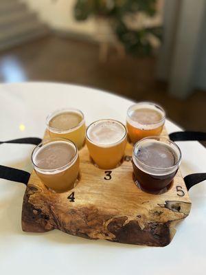 A flight including five of their signature beers