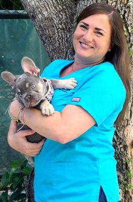 Office Manager- Michelle Koon with baby Buoy