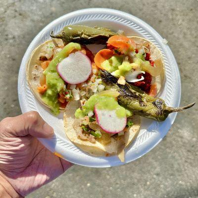 The grilled jalapeños were hot!  I enjoyed all of my tacos, but the buche was the best. The chicharron and chorizo were both very good.