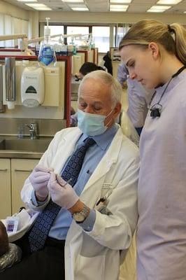 Dr. Bienenfeld instructs dental students at UW School of Dentistry