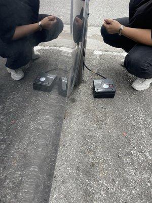 Tire was flat, getting air with a portable just to be able to get it to the gas station to put air in it