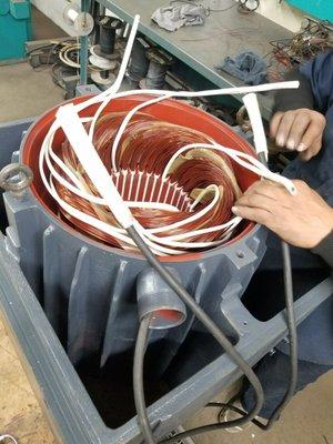 Our winder Beto working hard winding this 50HP motor for a huge wood saw machine!