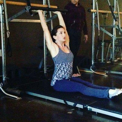 Our very own LeighAnn demonstrating on the Pilates Tower