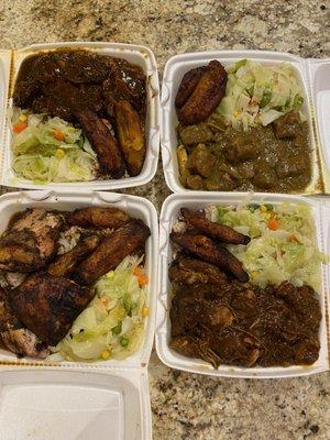 Oxtails, Curry Goat, Brown Stew Chicken, and Jerk Chicken (clockwise)