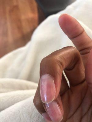 Cuticles over cut til bleeding. Beware of the nail techs here always rushing.