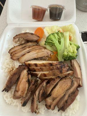 Teriyaki Chicken Bowl with white rice and vegetables .