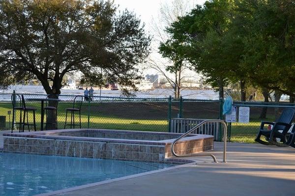 Swimming pool/Spa with Paddle Boat in back ground